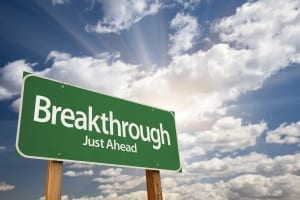 Breakthrough Green Road Sign with Dramatic Clouds and Sky.